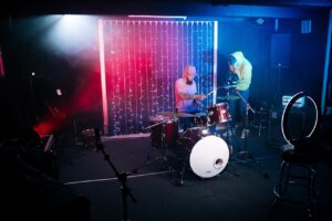 Filming a Man Playing the Drums